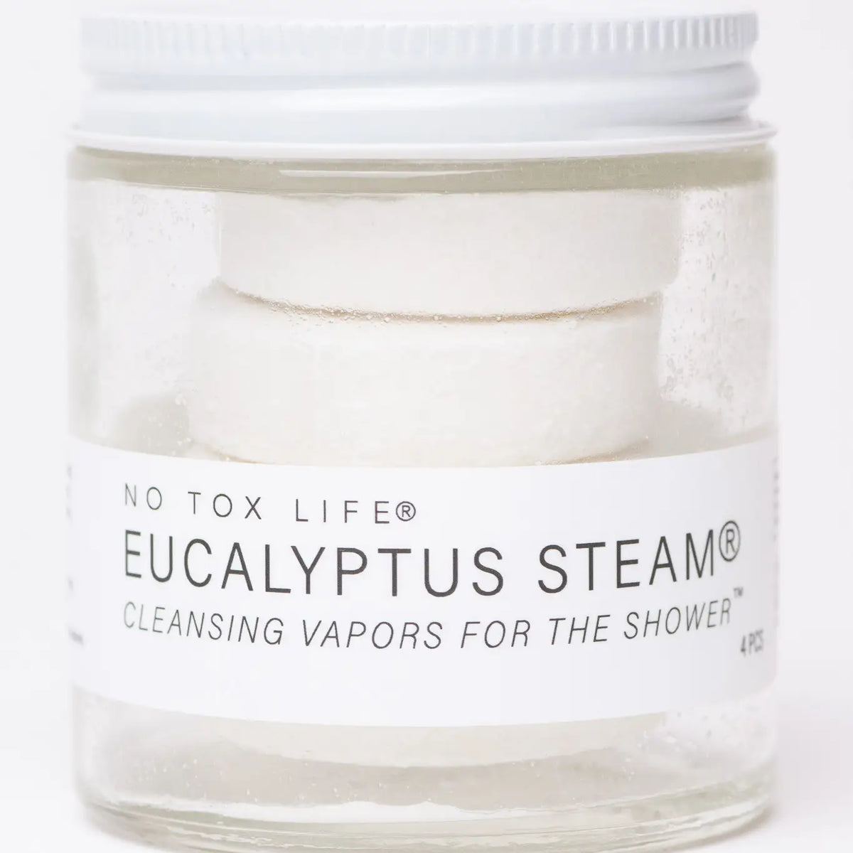 Jar of 'Eucalyptus Steam' cleansing vapors for the shower by No Tox Life on a white background